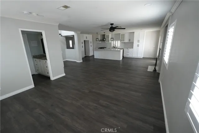a view of kitchen and windows