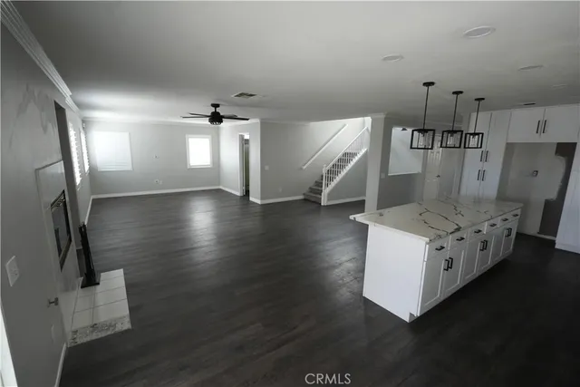 an entryway with wooden floor