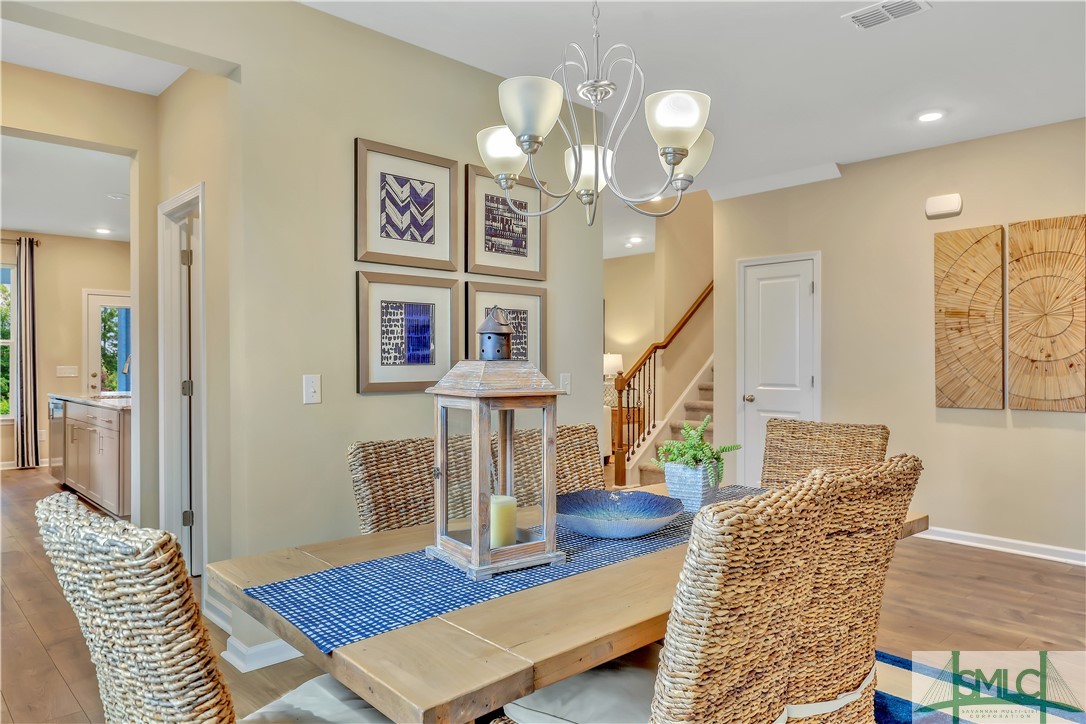 307 Serengeti Boulevard Pooler, GA 31322 - Photo 9 of 34 Dining room of model home.