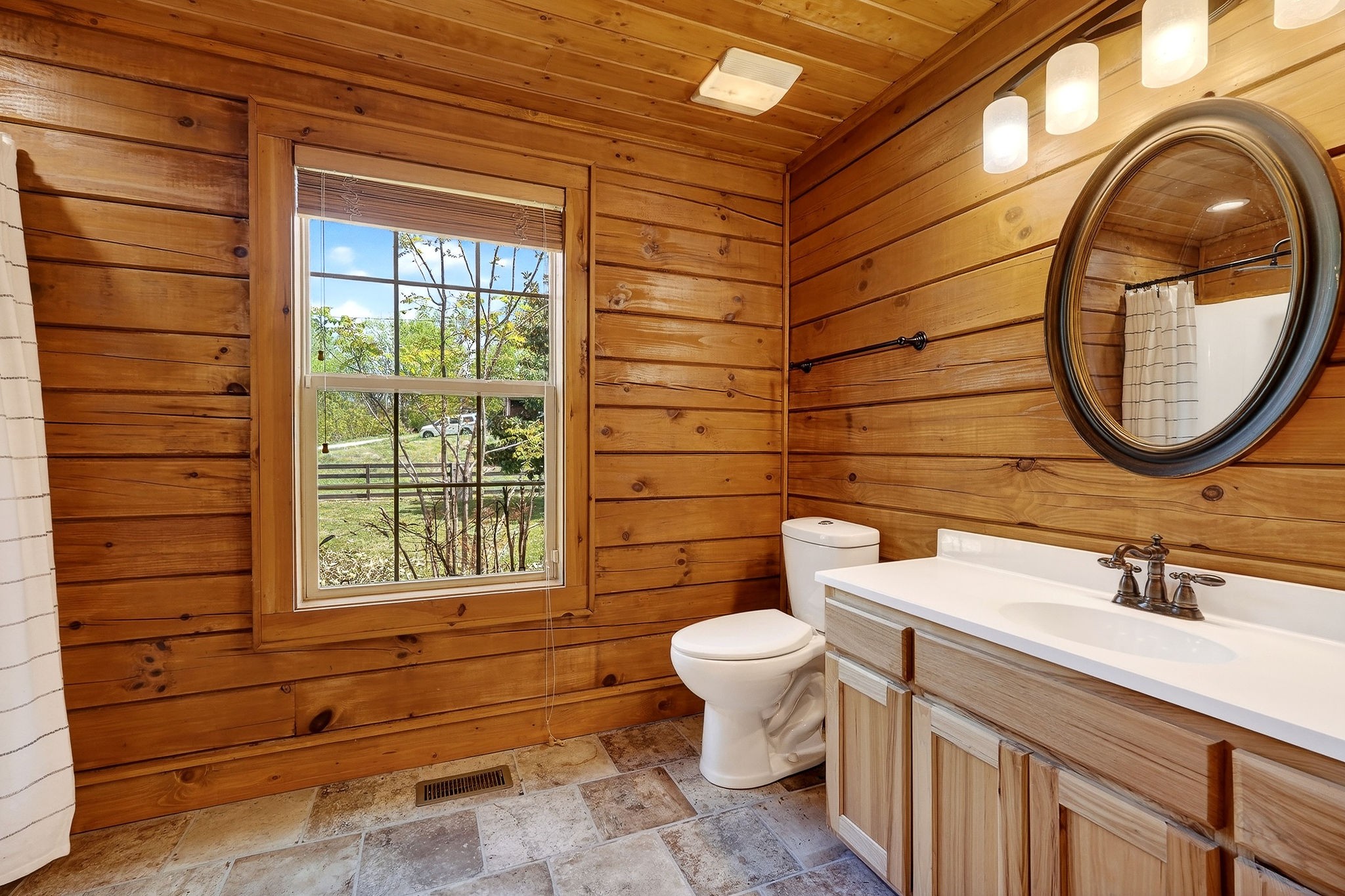 5175 Dale Ridge Road Liberty, TN 37095 - Photo 16 of 69 a bathroom with a sink a toilet and a mirror