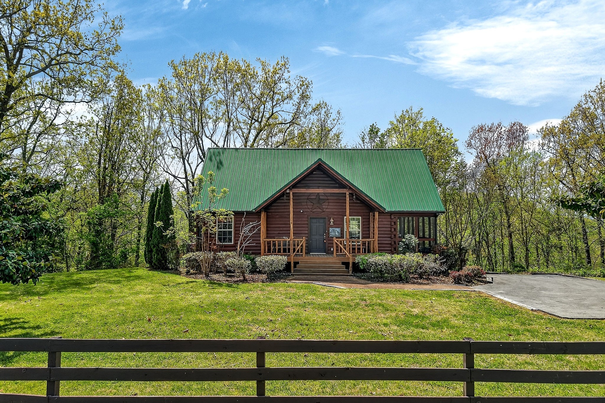 5175 Dale Ridge Road Liberty, TN 37095 - Photo 2 of 69 a front view of a house with garden