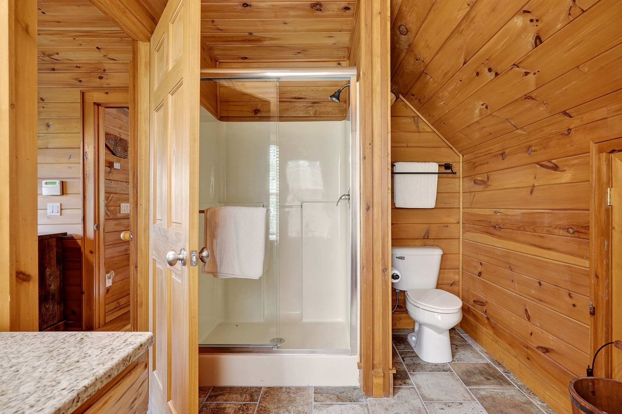 5175 Dale Ridge Road Liberty, TN 37095 - Photo 27 of 69 a bathroom with a granite countertop toilet a sink and shower