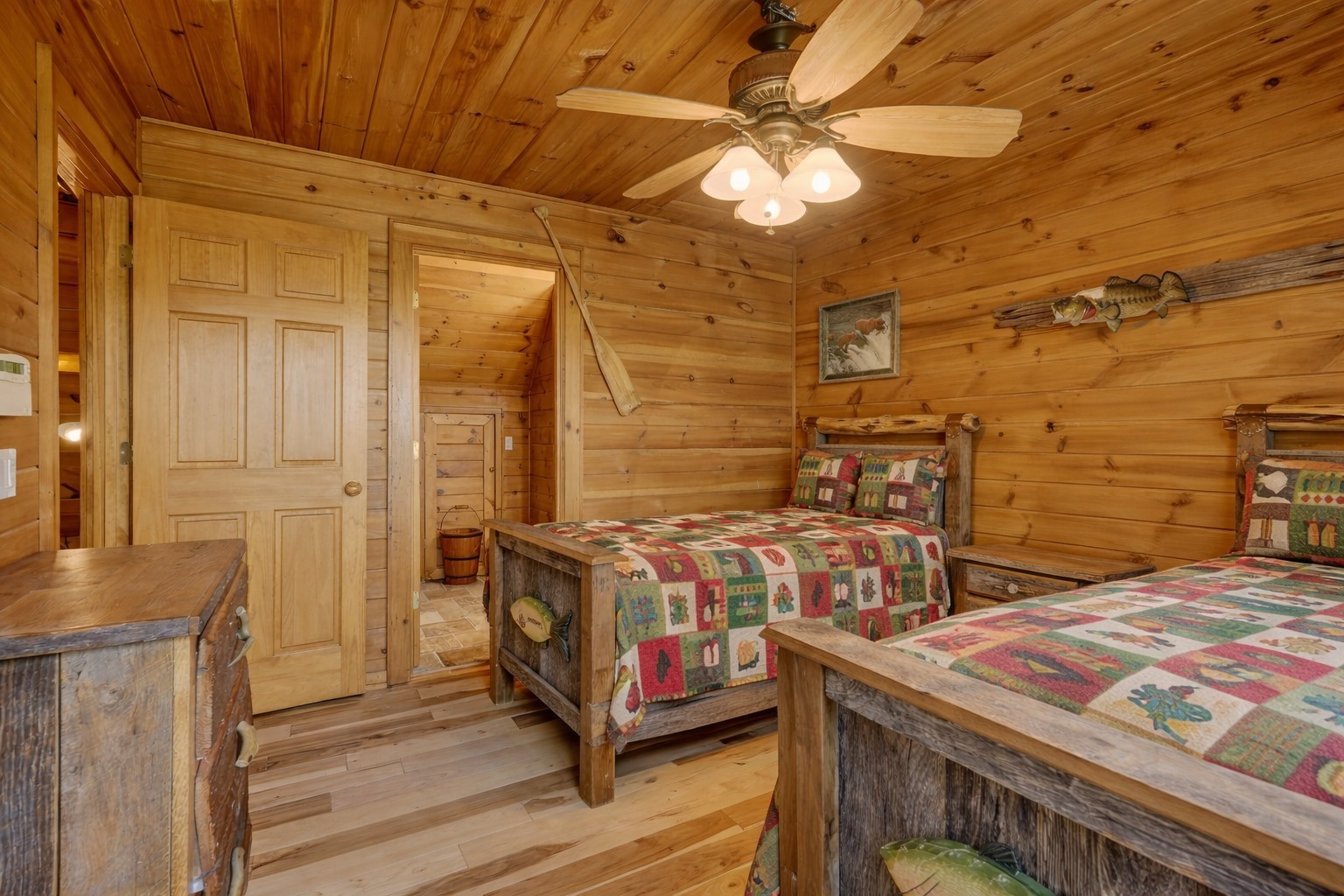 5175 Dale Ridge Road Liberty, TN 37095 - Photo 35 of 69 a bedroom with a bed and a chandelier