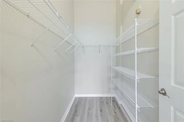 a view of a room with racks on the wall