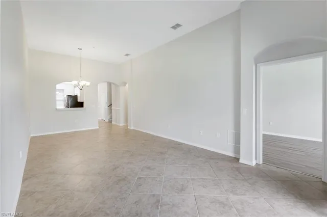 a view of a room with a hallway