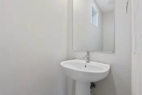 a sink with a mirror