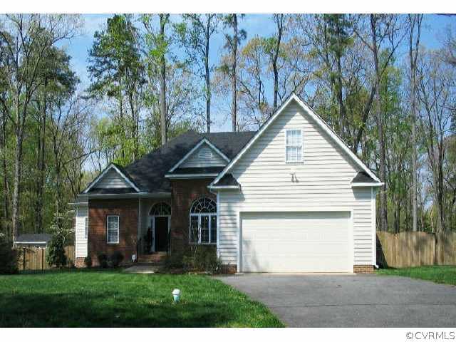 4046 Collingbourne Road Richmond, VA 23235 - Photo 1 of 1 a view of a house with yard and tree s
