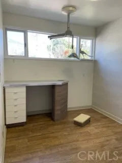 a view of a room with a large window