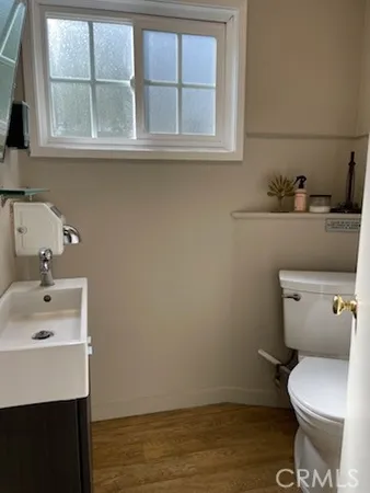 a bathroom with a sink and a toilet