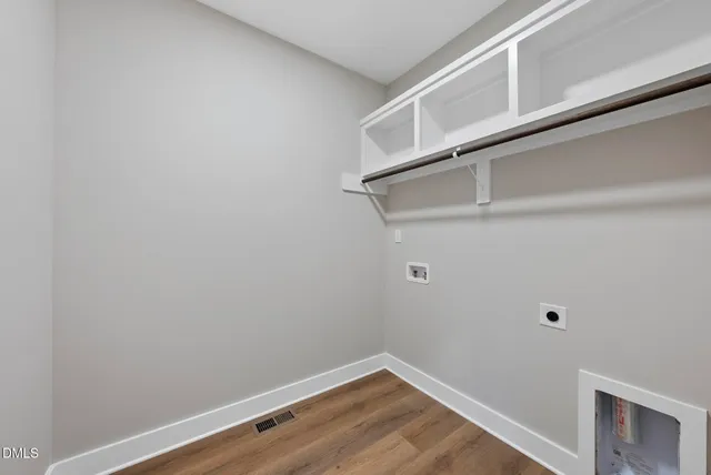 a view of small space with racks on the wall