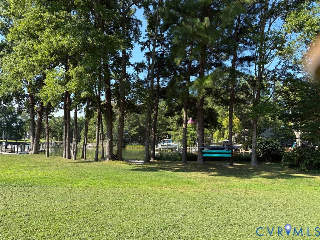 36 Rudder Place Heathsville, VA 22473 - Photo 6 of 9 Expansive green lawn with mature trees, offering w