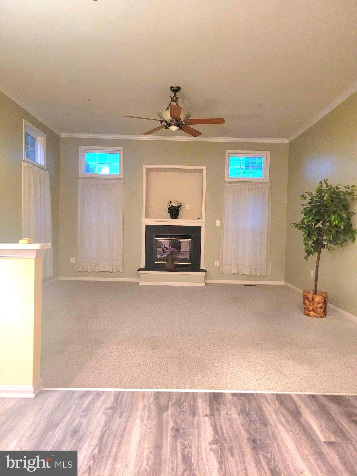 1202 Strausberg Street Accokeek, MD 20607 - Photo 38 of 43 Spacious living area with natural light.