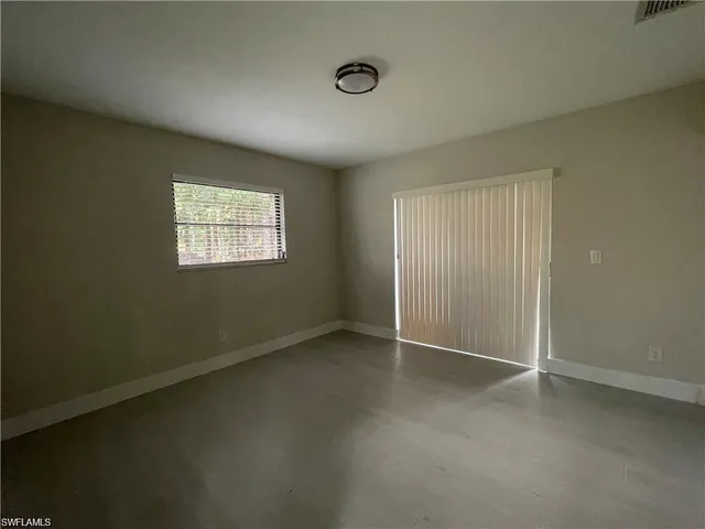 an empty room with windows