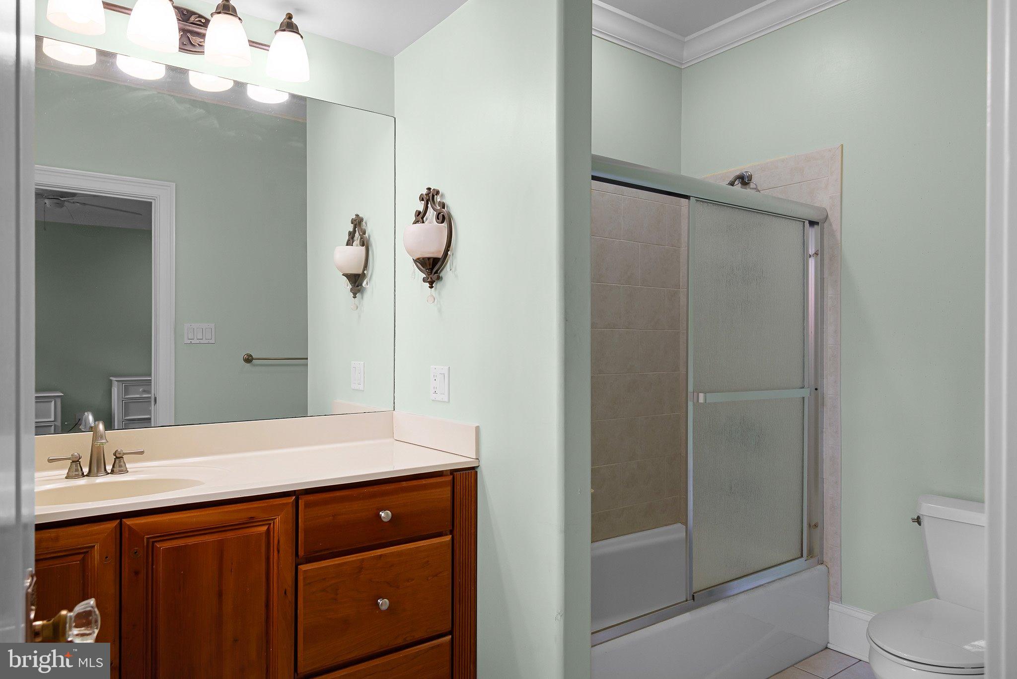 104 Timber Ridge Lane Chadds Ford, PA 19317 - Photo 36 of 65 a bathroom with a sink a toilet and shower