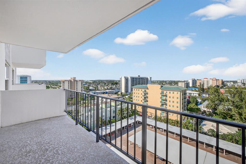 405 North Ocean Boulevard, Unit 1027 Pompano Beach, FL 33062 - Photo 13 of 57 a view of a city from a balcony