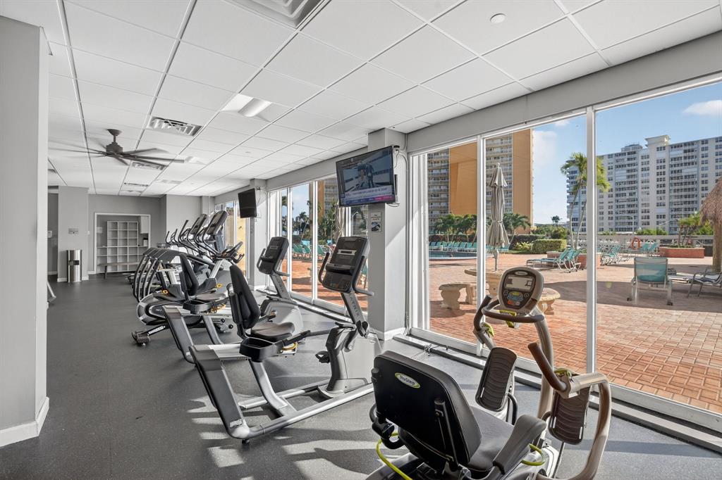 405 North Ocean Boulevard, Unit 1027 Pompano Beach, FL 33062 - Photo 22 of 57 a view of a room with gym equipment