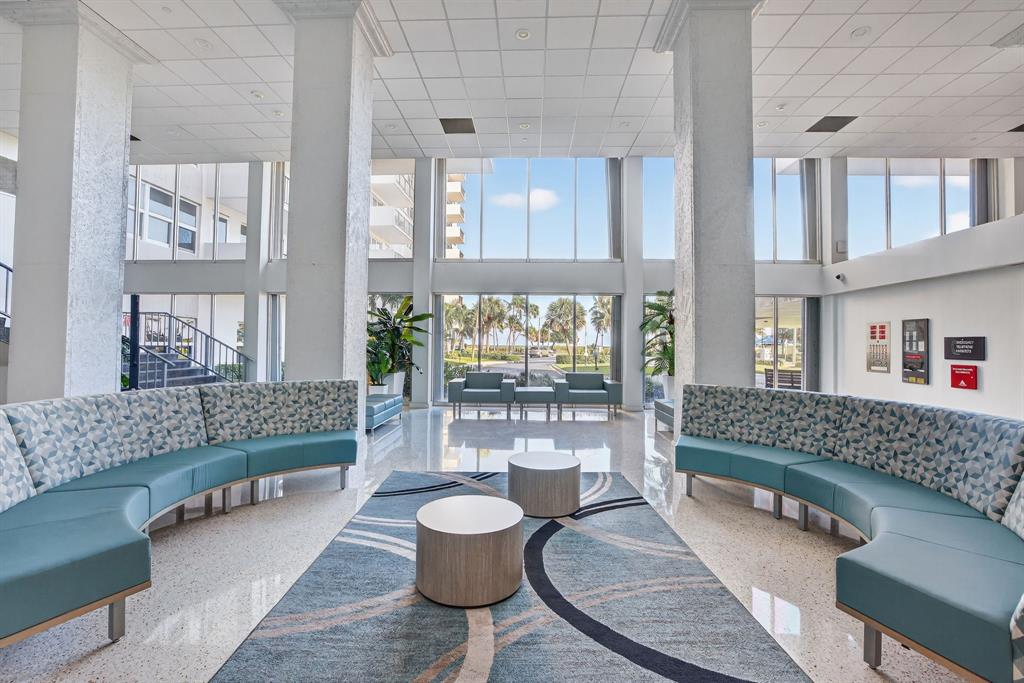 405 North Ocean Boulevard, Unit 1027 Pompano Beach, FL 33062 - Photo 24 of 57 a living room with furniture and a large window