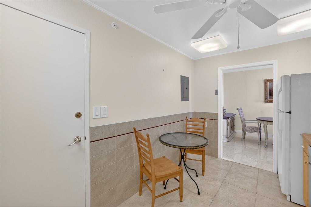 405 North Ocean Boulevard, Unit 1027 Pompano Beach, FL 33062 - Photo 43 of 57 a dining room with furniture and view of kitchen