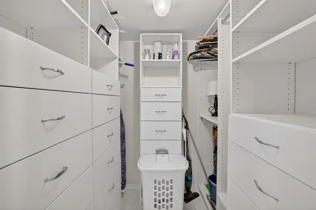 an aerial view of residential building and ocean view