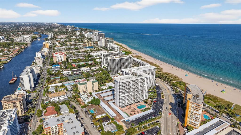 405 North Ocean Boulevard, Unit 1027 Pompano Beach, FL 33062 - Photo 54 of 57 an aerial view of residential houses with outdoor space
