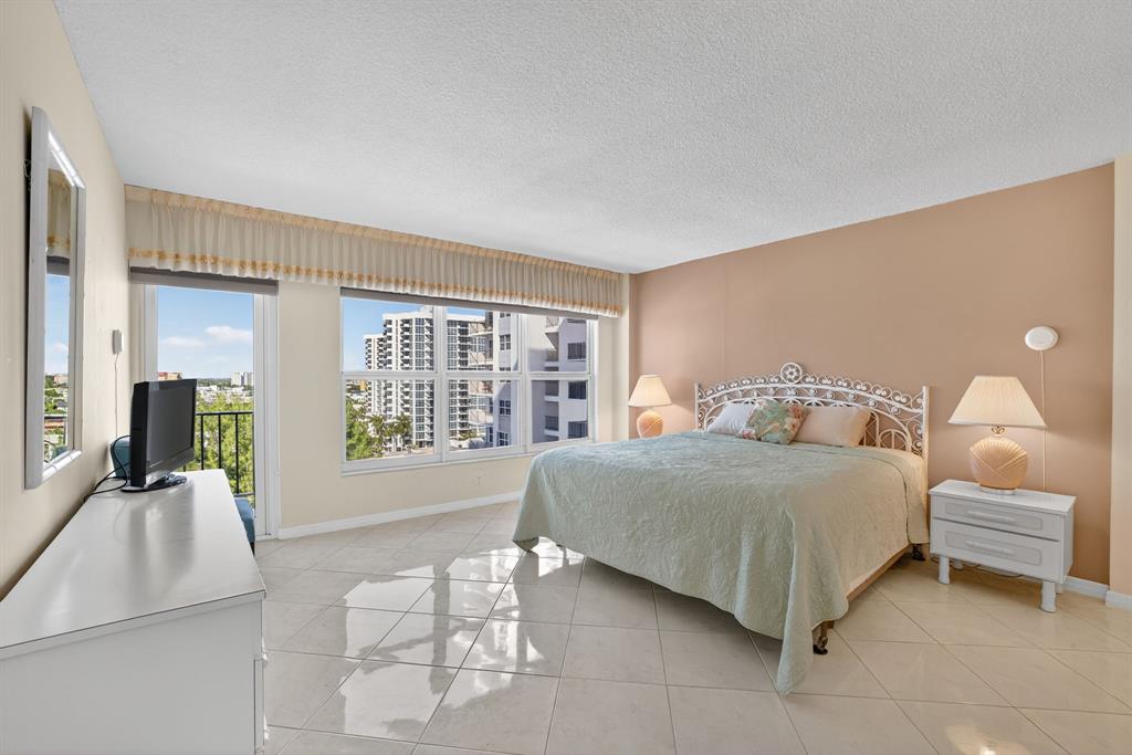 405 North Ocean Boulevard, Unit 1027 Pompano Beach, FL 33062 - Photo 10 of 57 Oversized Bedroom with a standard closet and large walk-in closet.