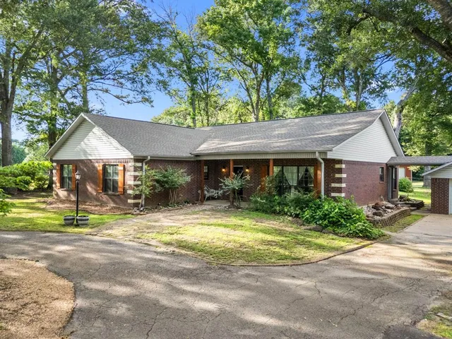 a view of large house with a outdoor space