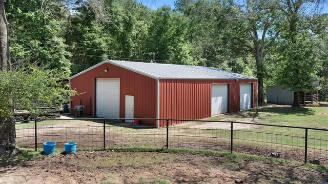 a view of backyard with a garden and entertaining space
