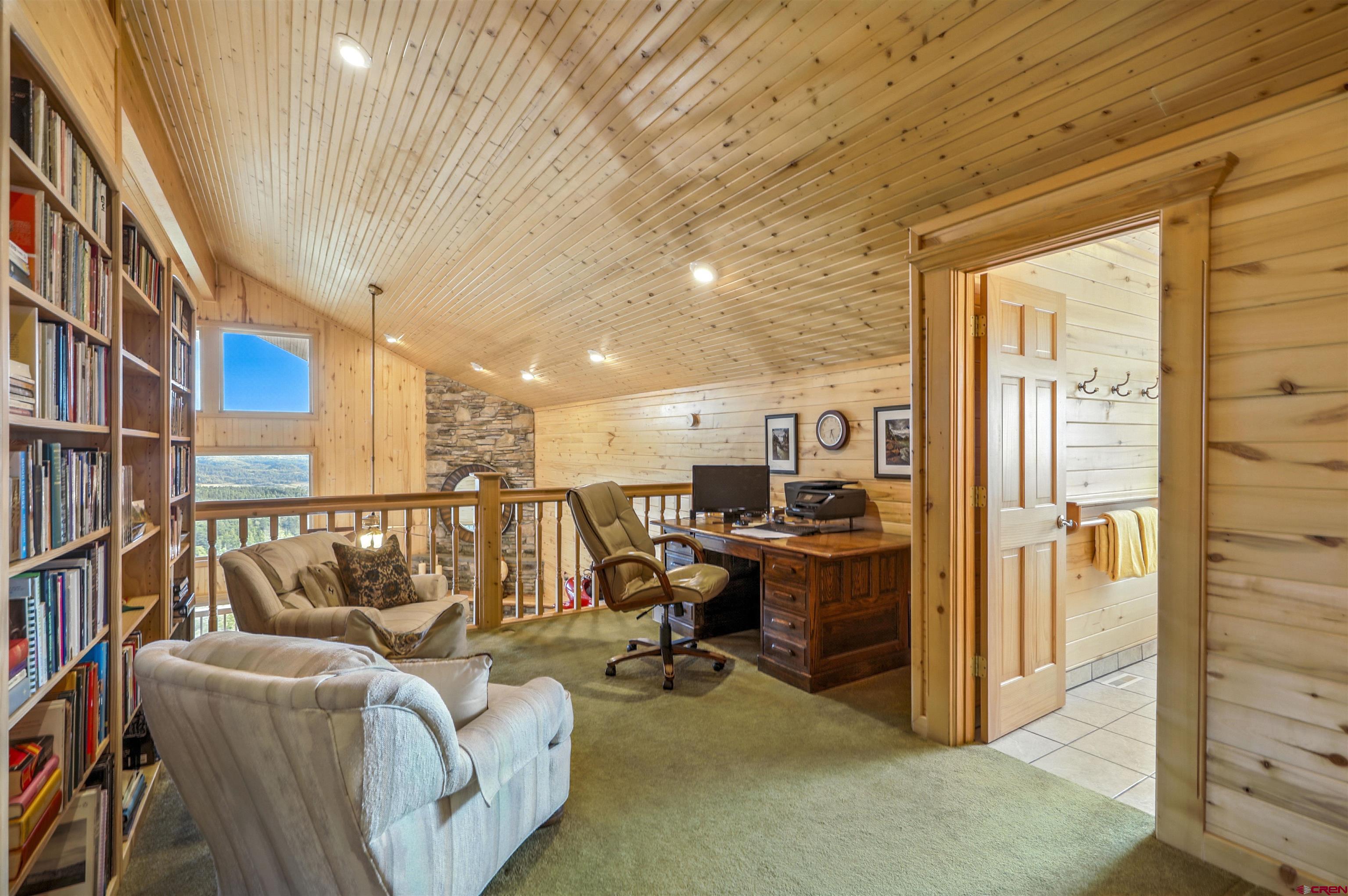 1100 Soaring Eagle Court Chromo, CO 81128 - Photo 23 of 44 a view of a furniture in a room with a couch
