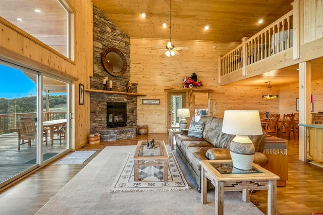 a outdoor space with lots of furniture and wooden floor