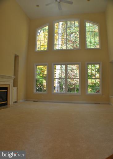 7420 Spring Summit Road Springfield, VA 22150 - Photo 5 of 30 2 Story Family Rm w/ Gas FP and Built In Cabinetry