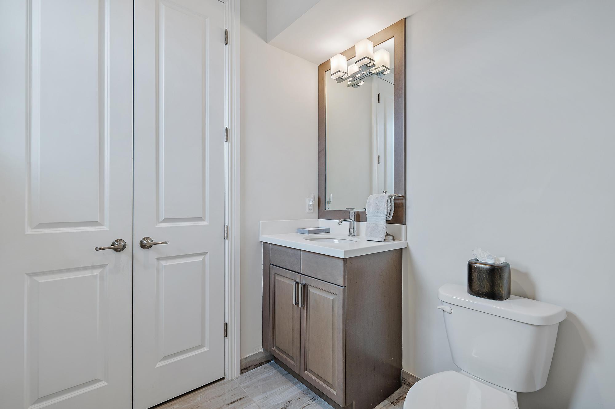 8164 Southeast Old Plantation Circle Jupiter, FL 33458 - Photo 43 of 60 Upstairs Half Bath