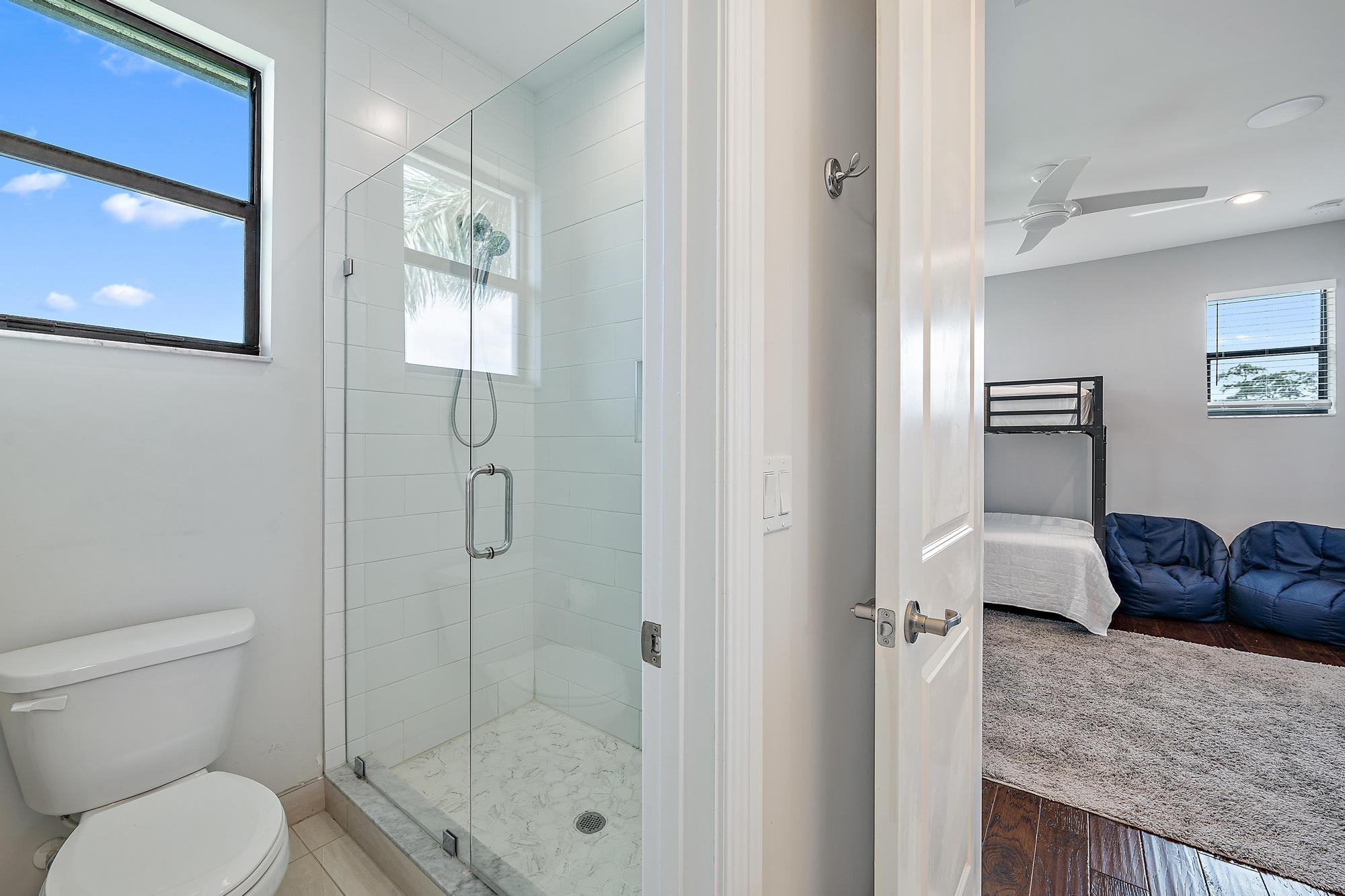 8164 Southeast Old Plantation Circle Jupiter, FL 33458 - Photo 49 of 60 Jack and Jill Bathroom