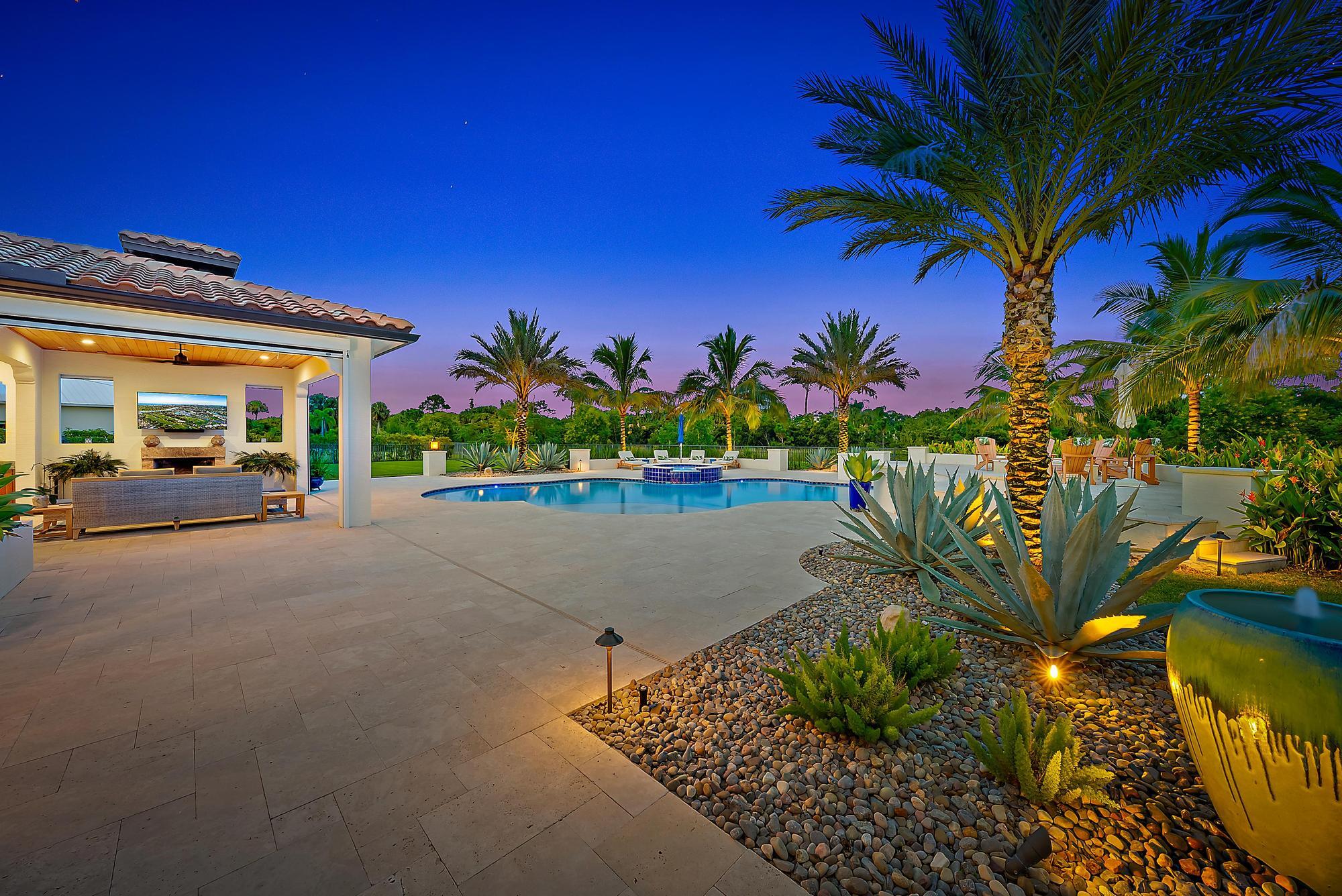 8164 Southeast Old Plantation Circle Jupiter, FL 33458 - Photo 58 of 60 Travertine pool deck