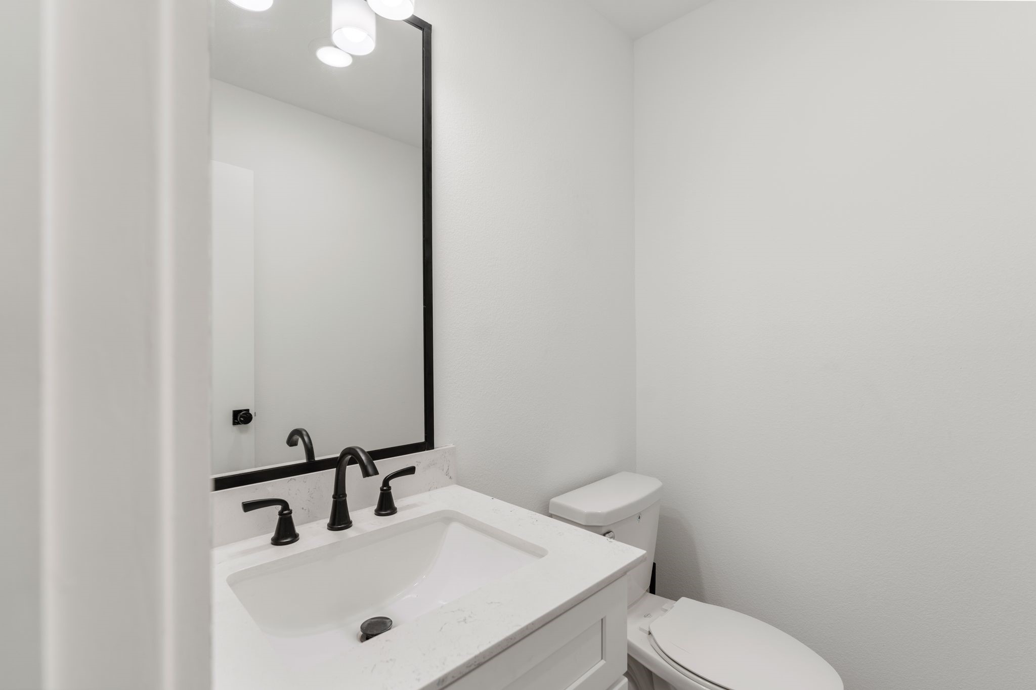 4862 Brinkman Street Houston, TX 77018 - Photo 11 of 33 Discretely placed half bath on the second floor.