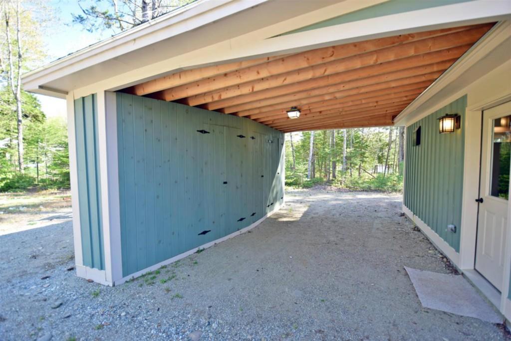 213 Tannery Brook Road Ellsworth, ME 04605 - Photo 33 of 35 Handy carport with tons of storage.