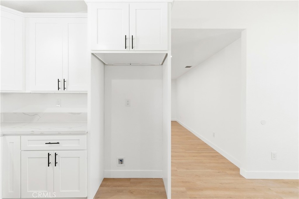 22557 Ojai Road Apple Valley, CA 92308 - Photo 12 of 57 a view of an empty room with closet