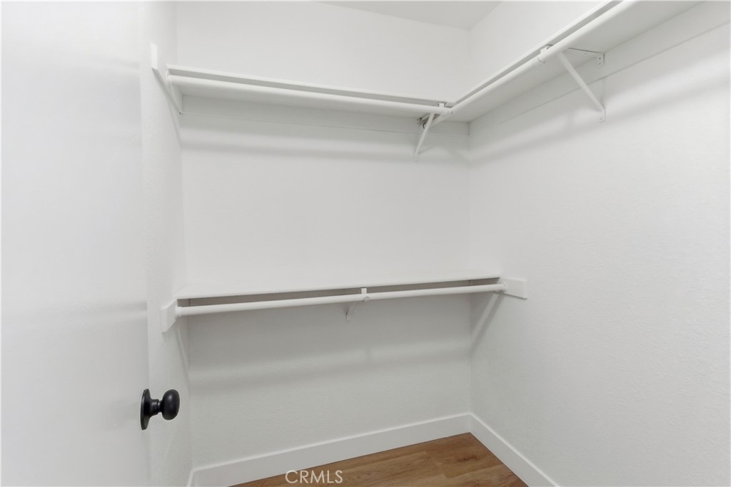 22557 Ojai Road Apple Valley, CA 92308 - Photo 34 of 57 a view of an empty walk in closet