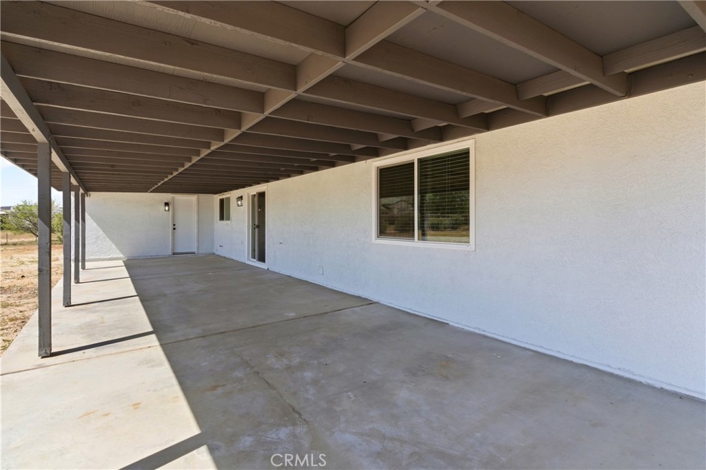 22557 Ojai Road Apple Valley, CA 92308 - Photo 39 of 57 a view of a porch