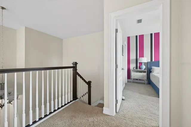 a view of a bedroom from hallway