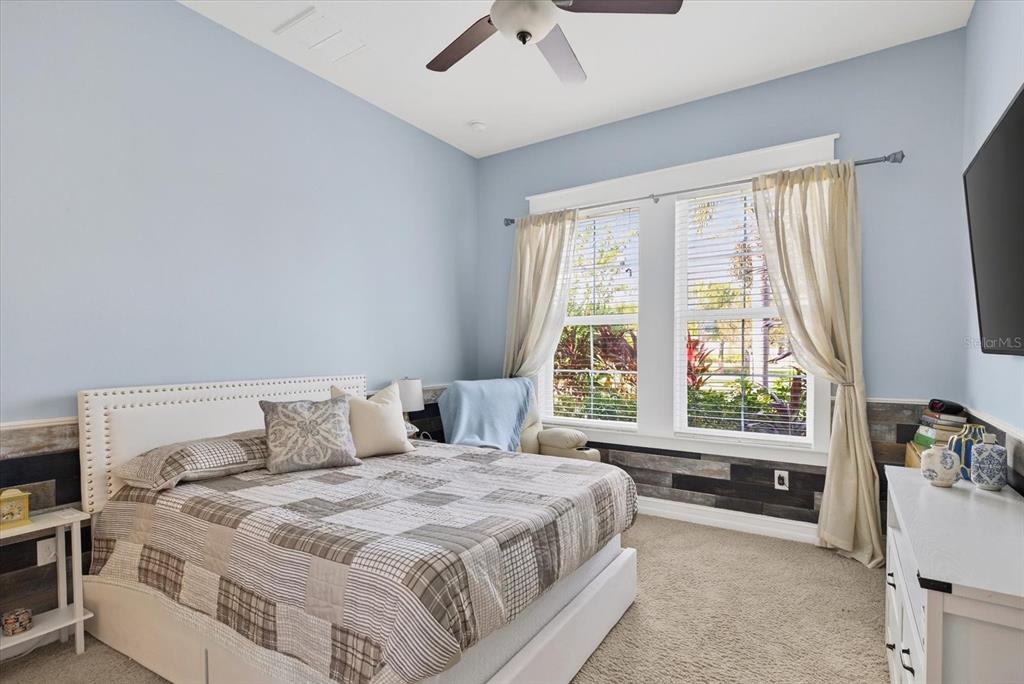 6609 Current Drive Apollo Beach, FL 33572 - Photo 33 of 47 a bedroom with a bed and a window