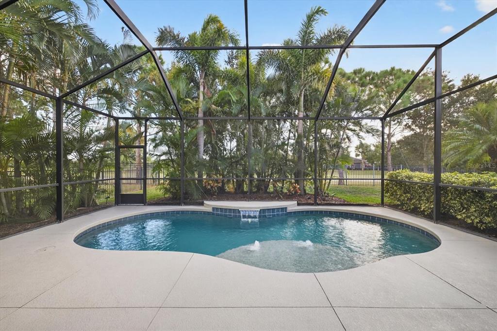 6609 Current Drive Apollo Beach, FL 33572 - Photo 37 of 47 a view of a swimming pool with a patio