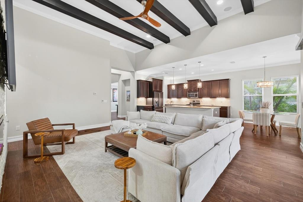 6609 Current Drive Apollo Beach, FL 33572 - Photo 7 of 47 a living room with furniture and a piano