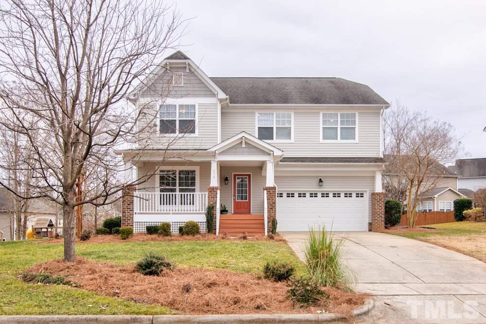 874 Seastone Street Raleigh, NC 27603 - Photo 1 of 30 a front view of a house with a yard