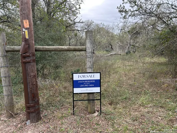 a sign on the side of a road