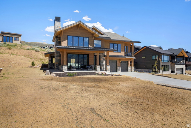10646 North Reflection Ridge Hideout, UT 84036 - Photo 3 of 43 Contemporary residence featuring a multi-level design with stone and wood siding