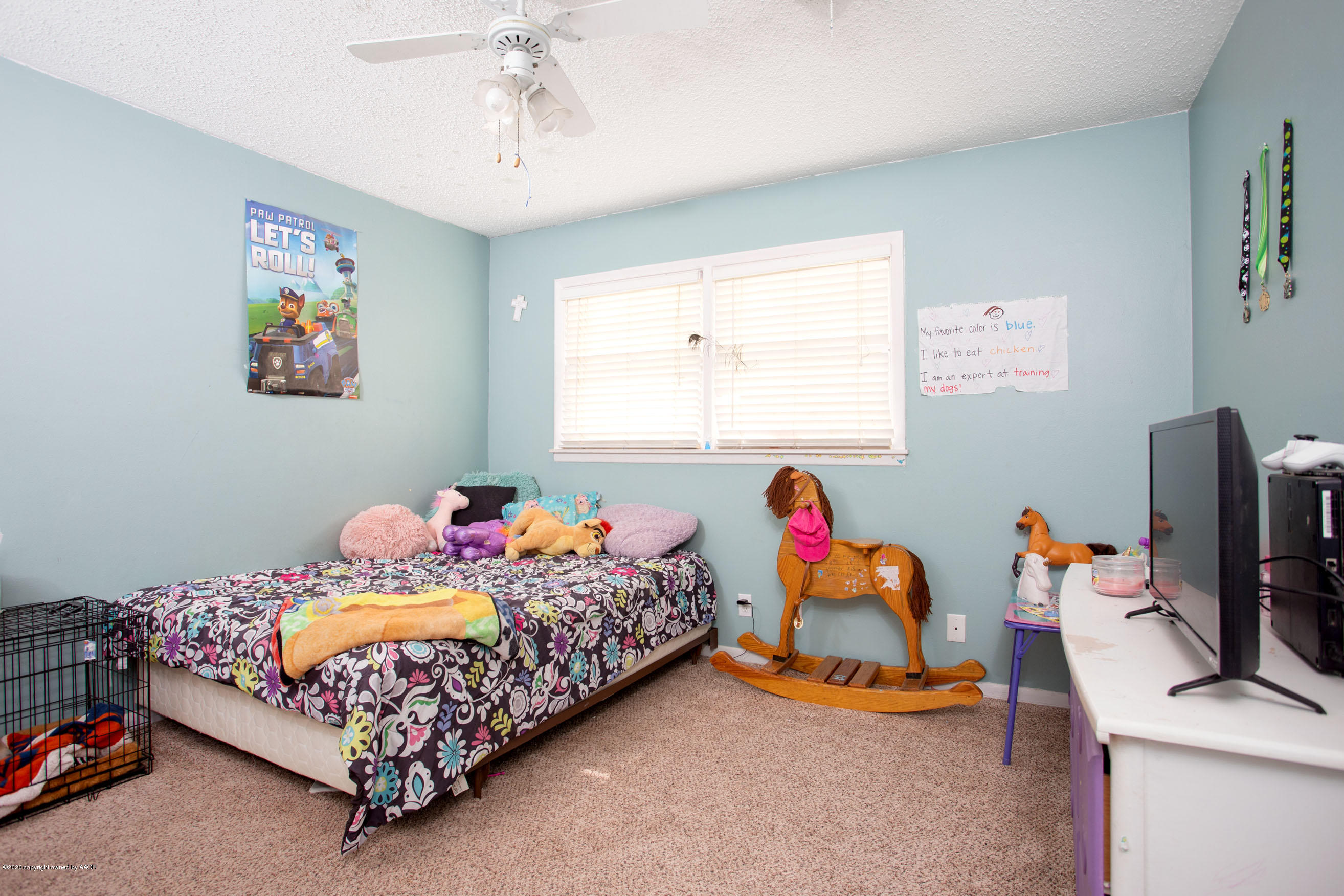 4712 South Milam Street Amarillo, TX 79110 - Photo 15 of 22 a bedroom with bed and a window