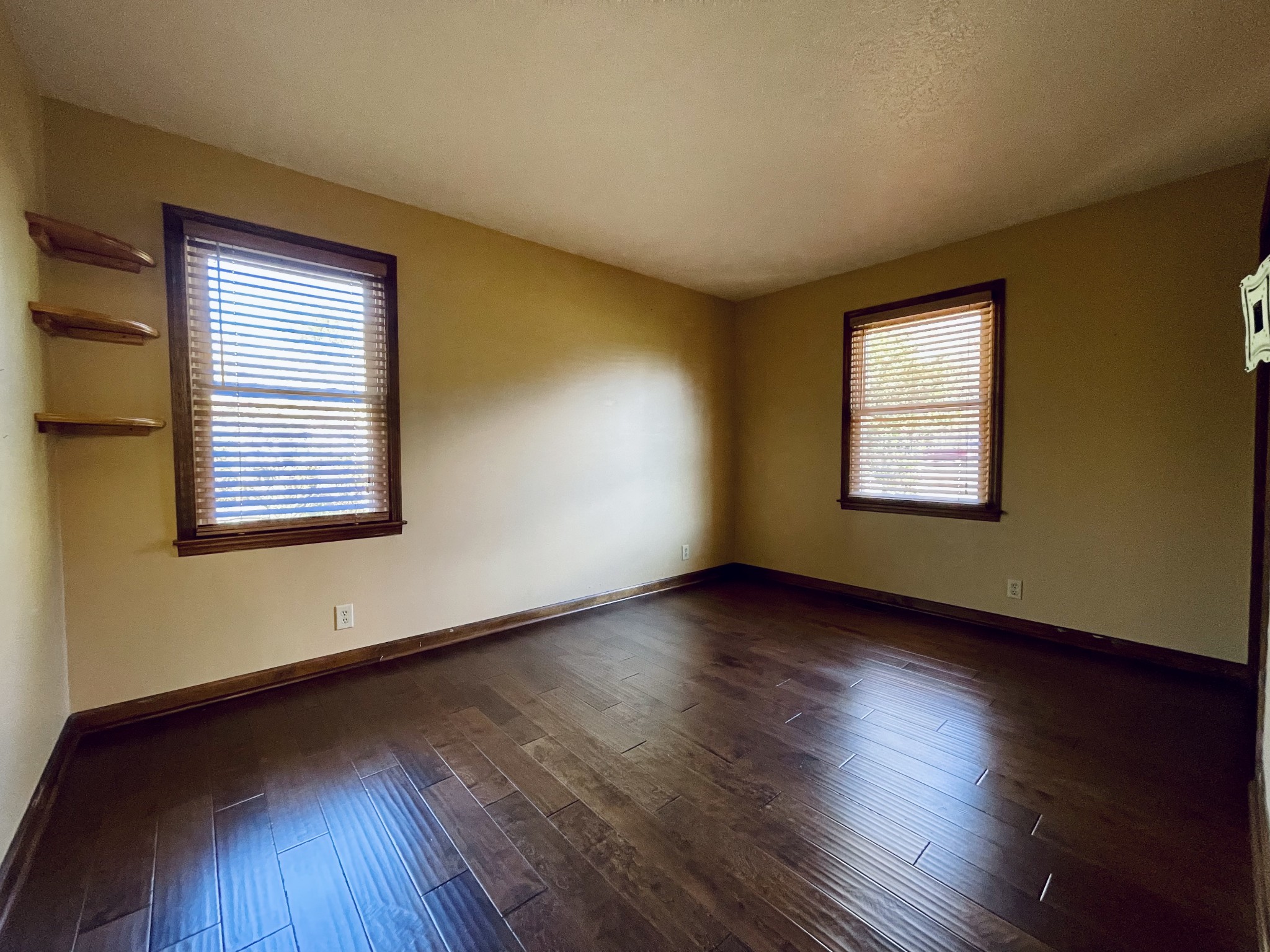 2911 New Hope Road Hendersonville, TN 37075 - Photo 17 of 27 a view of an empty room with wooden floor and a window