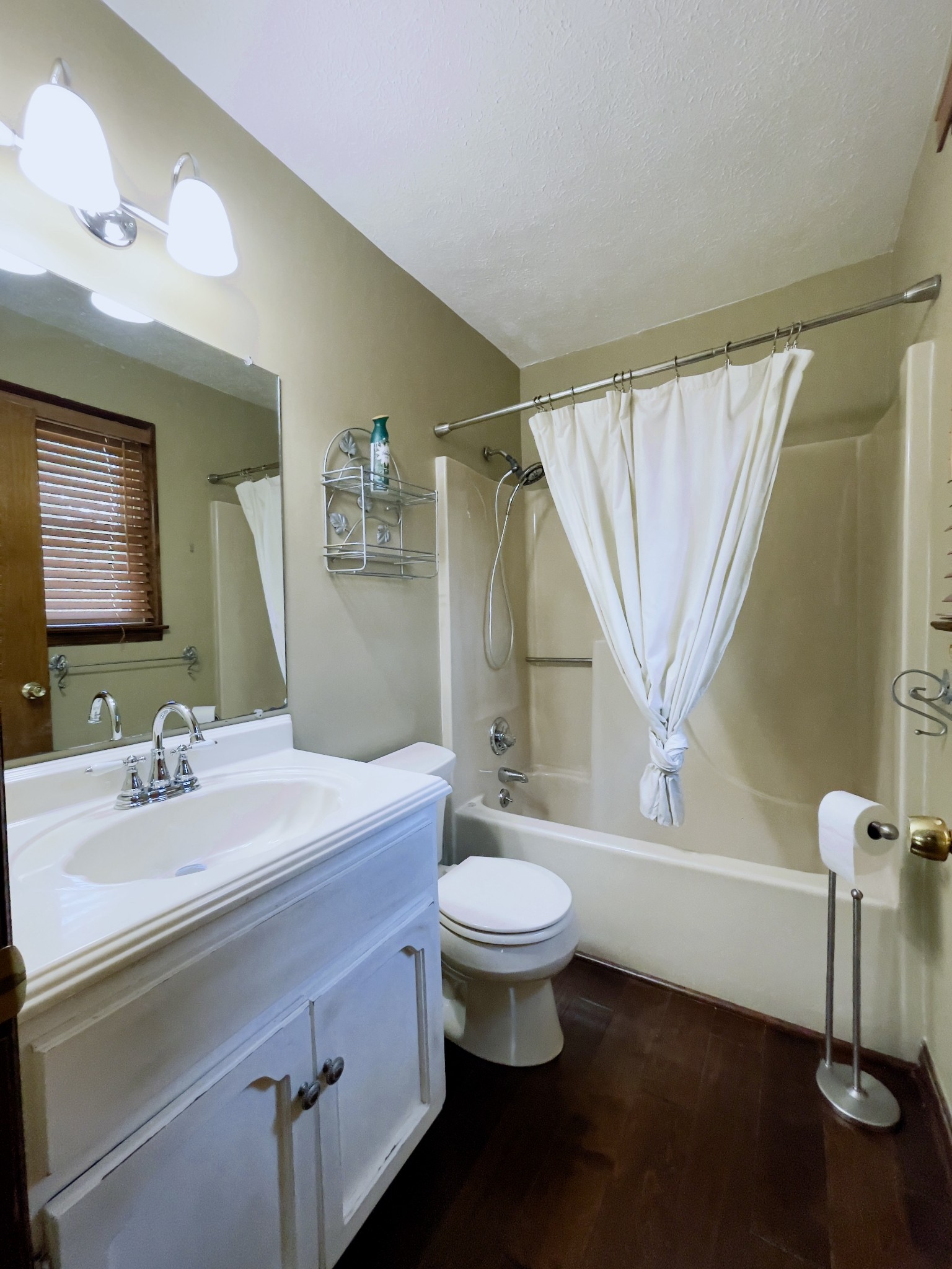 2911 New Hope Road Hendersonville, TN 37075 - Photo 19 of 27 a bathroom with a sink toilet a mirror and shower