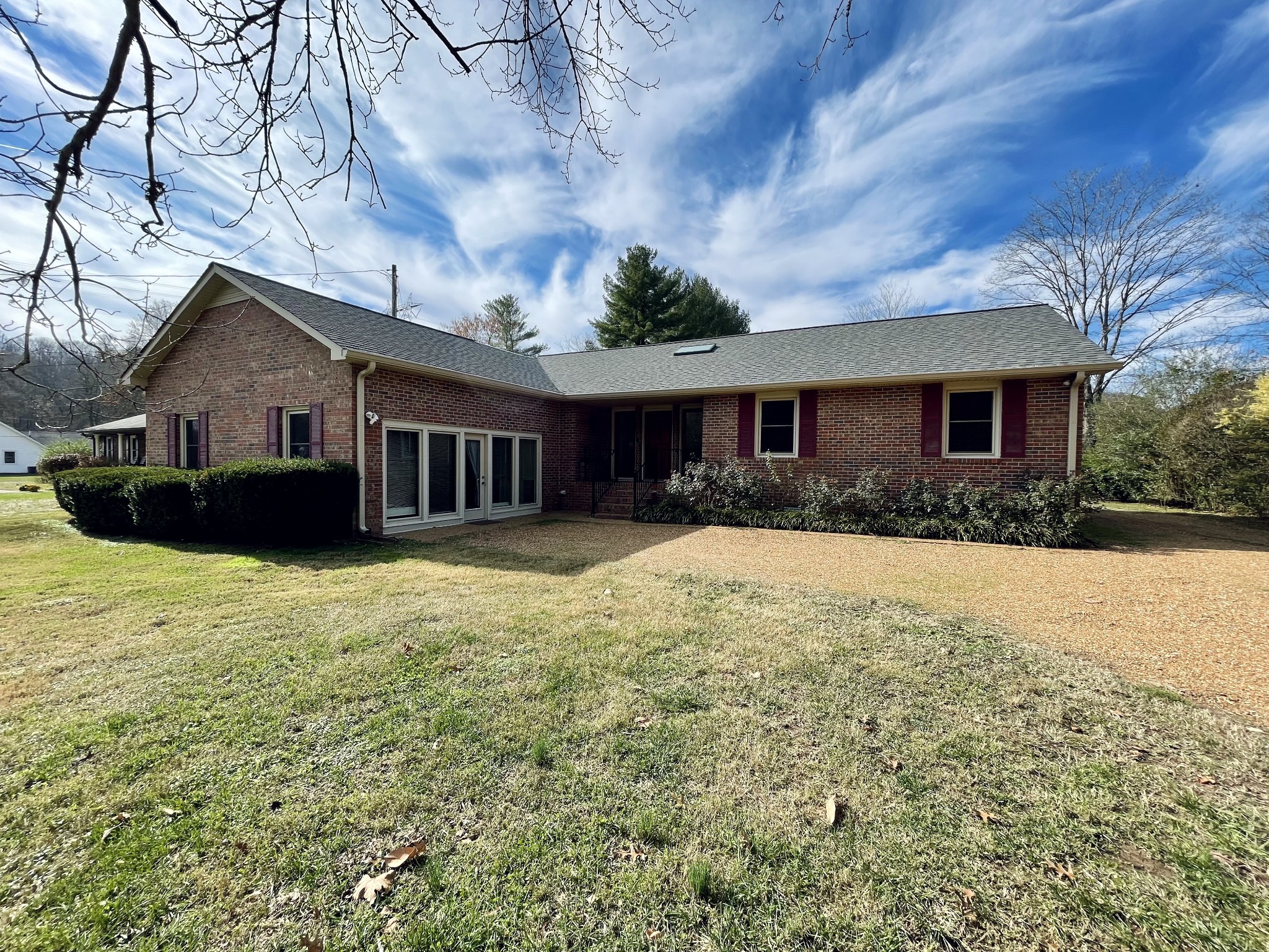 2911 New Hope Road Hendersonville, TN 37075 - Photo 2 of 27 a front view of house with yard and trees around