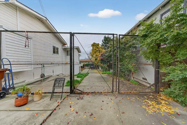 a swimming pool with outdoor seating and yard